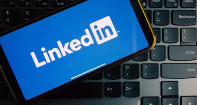 LinkedIn logo displayed on a smartphone.