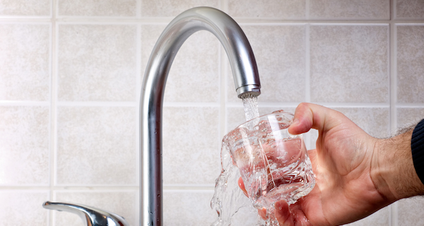 Drinking water from the water tap